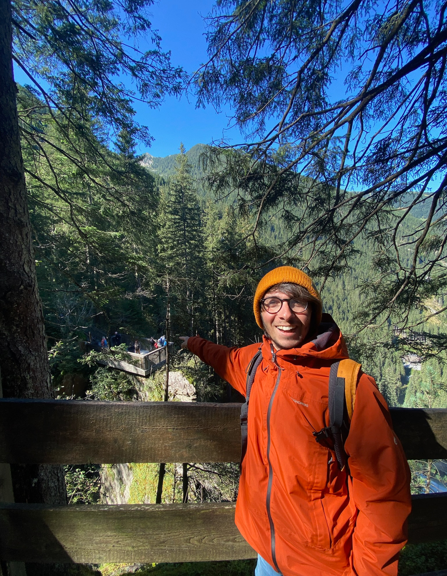 Charlie pointing at the paid trail viewing platform from the Alter Tauernweg free walking trail